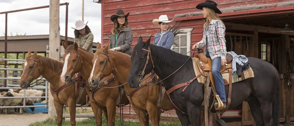 Michelle Morgan riding a horse as Lou Fleming on Heartland